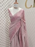 Semi tussar with arch border embroidery