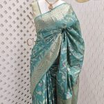 Tussar banarasi with wavy contrast floral and golden zari design