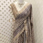 Jute silk with flower embroidery pallu and flower batik body