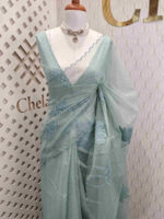 Organza with lotus flower and leaf applique with polka dot blouse