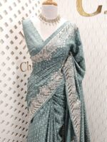 Semi tussar with peacock feather like work and cut work on border