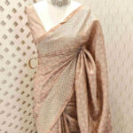 Semi tussar with tie and dye body and cut work border