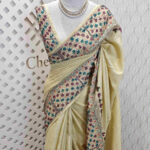 Tussar with lambani flower border thread work