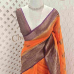 Organza banarasi with flower plant buttas and contrast boarder