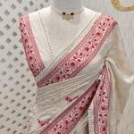 Jute silk with traditional floral embroidery motifs