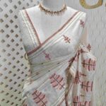 Jute silk with pine tree like thread embroidery design