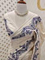 Jute silk with floral paisley scallop like thread embroidery pattern
