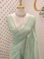 Organza with lotus flower like satin thread work and scallop border