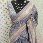 Semi tussar with small oval shape buttas and diamond shape on border
