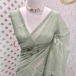 Tissue with raised chain stitch flower motifs