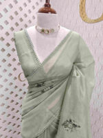 Tissue with raised chain stitch flower motifs