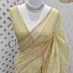 Tissue with lattice embroidery pattern