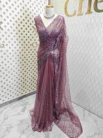 Net saree with sequence, stones small floral pattern and scallop border - Image 13