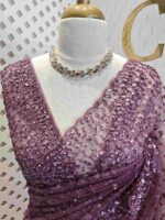 Net saree with sequence, stones small floral pattern and scallop border - Image 12