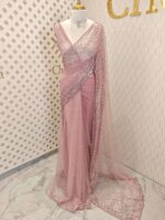 Net saree with sequence, stones small floral pattern and scallop border - Image 25