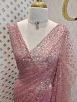 Net saree with sequence, stones small floral pattern and scallop border - Image 26