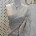 Organza with maple leaf applique like design and scallop border