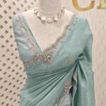 Crushed silk with leafy motifs and cut bead, sequence on scallop border