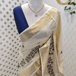 Kerala saree with pearl embroidery and satin like thread floral design