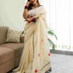 Kerala saree with big polka dots and contrast blouse