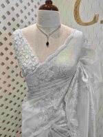 Organza with foil like embossed floral design and scallop border