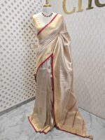 Kerala saree with check pattern and contrast colour on border - Image 10