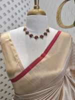 Kerala saree with check pattern and contrast colour on border - Image 9