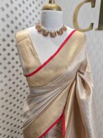 Kerala saree with check pattern and contrast colour on border