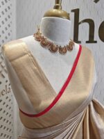 Kerala saree with check pattern and contrast colour on border - Image 2