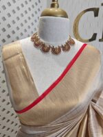 Kerala saree with check pattern and contrast colour on border - Image 3