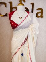 Kerala saree with polka dot and stripes, small flower like pattern