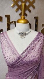 Net saree with sequence, stones small floral pattern and scallop border - Image 41
