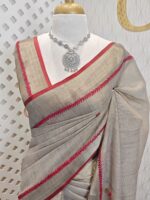 Linen with hand embroidered flower and leaves with fly stitches on boarder
