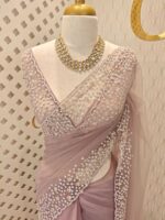 Net saree with small sugar beads floral and sequence floral design on border - Image 20