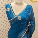 Georgette with stone work motifs and scallop border