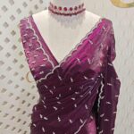 Georgette with bindi like design and scallop border