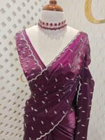 Georgette with bindi like design and scallop border