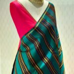 Kanjeevaram with vertical stripes with golden detail and contrast pallu
