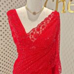 Net saree with garden like beads, sequence work and heavy work on pallu