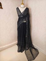 Net saree with sequence, stones small floral pattern and scallop border - Image 31