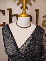 Net saree with sequence, stones small floral pattern and scallop border - Image 29