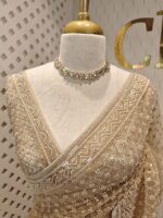 Net saree with diamond like jaal design and beaded zigzag pattern on border - Image 2
