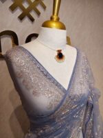Net saree with thick boarders with floral patterns - Image 24