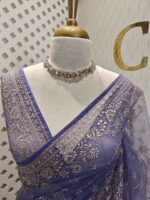 Net saree with thick boarders with floral patterns - Image 17