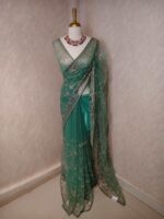 Net saree with thick boarders with floral patterns - Image 31