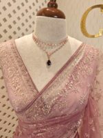 Net saree with thick boarders with floral patterns - Image 14