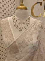 Net saree with thick boarders with floral patterns - Image 2