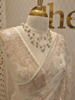 Net saree with thick boarders with floral patterns - Image 3