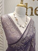 Net saree with thick boarders with floral patterns - Image 9