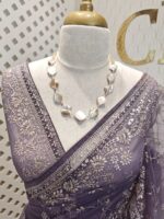 Net saree with thick boarders with floral patterns - Image 8